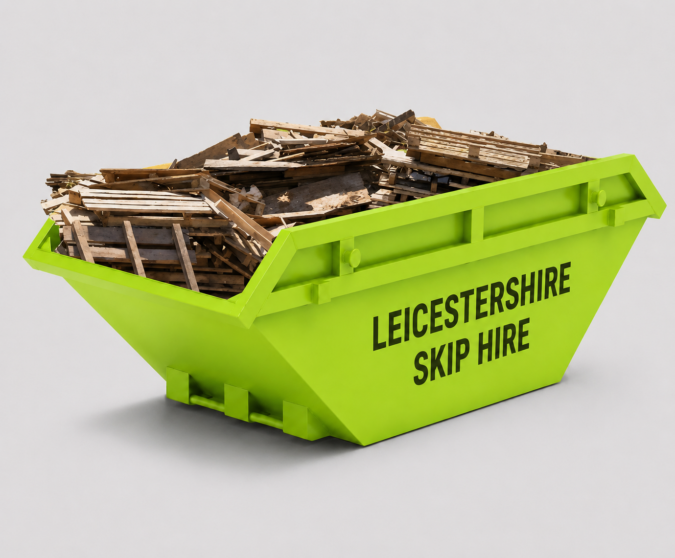 A bright green skip filled with assorted wooden debris, labeled 'Leicestershire Skip Hire'.