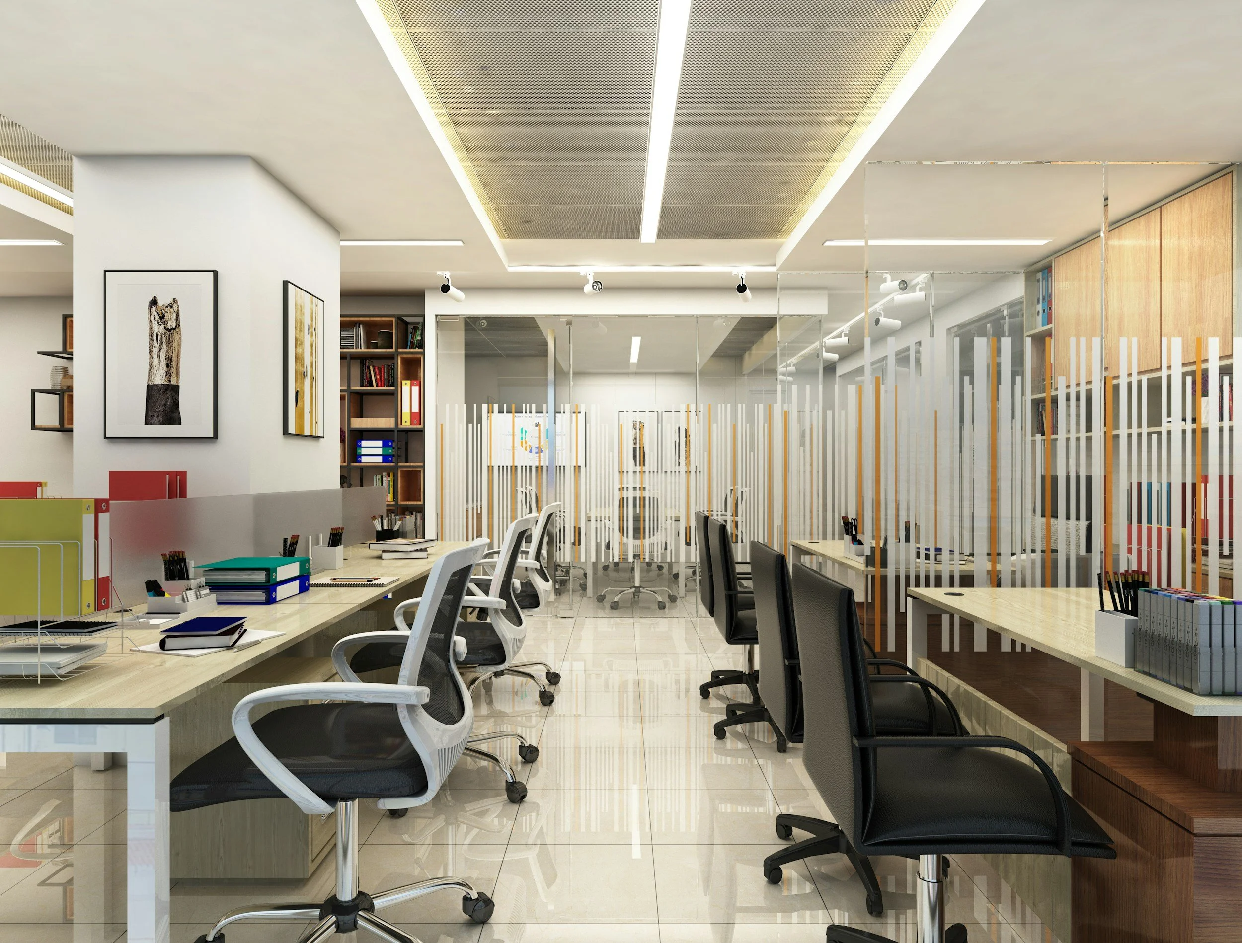 Clean modern commercial office with desks and workstations.