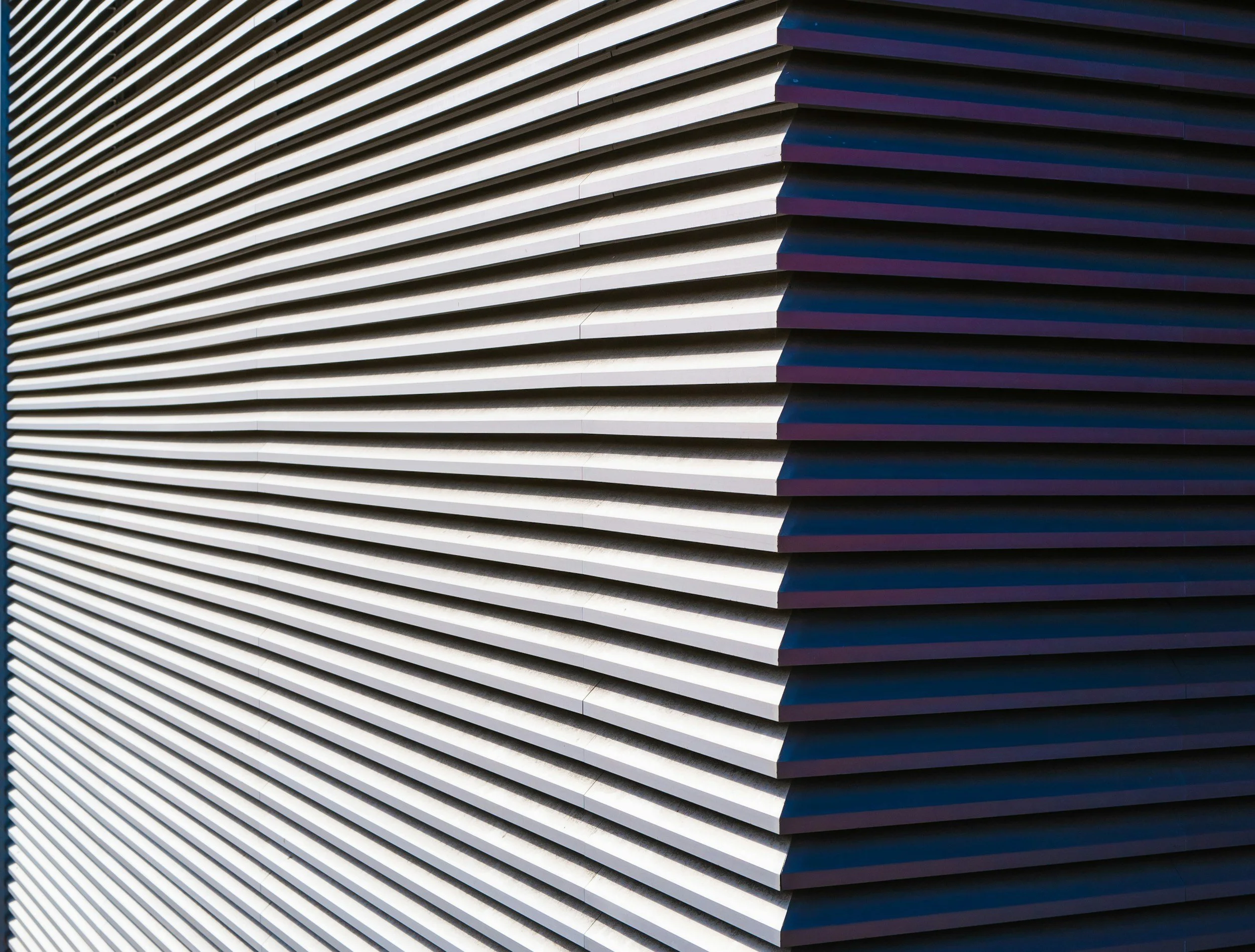 Recycled PET composite structural sheathing system for exterior construction applications