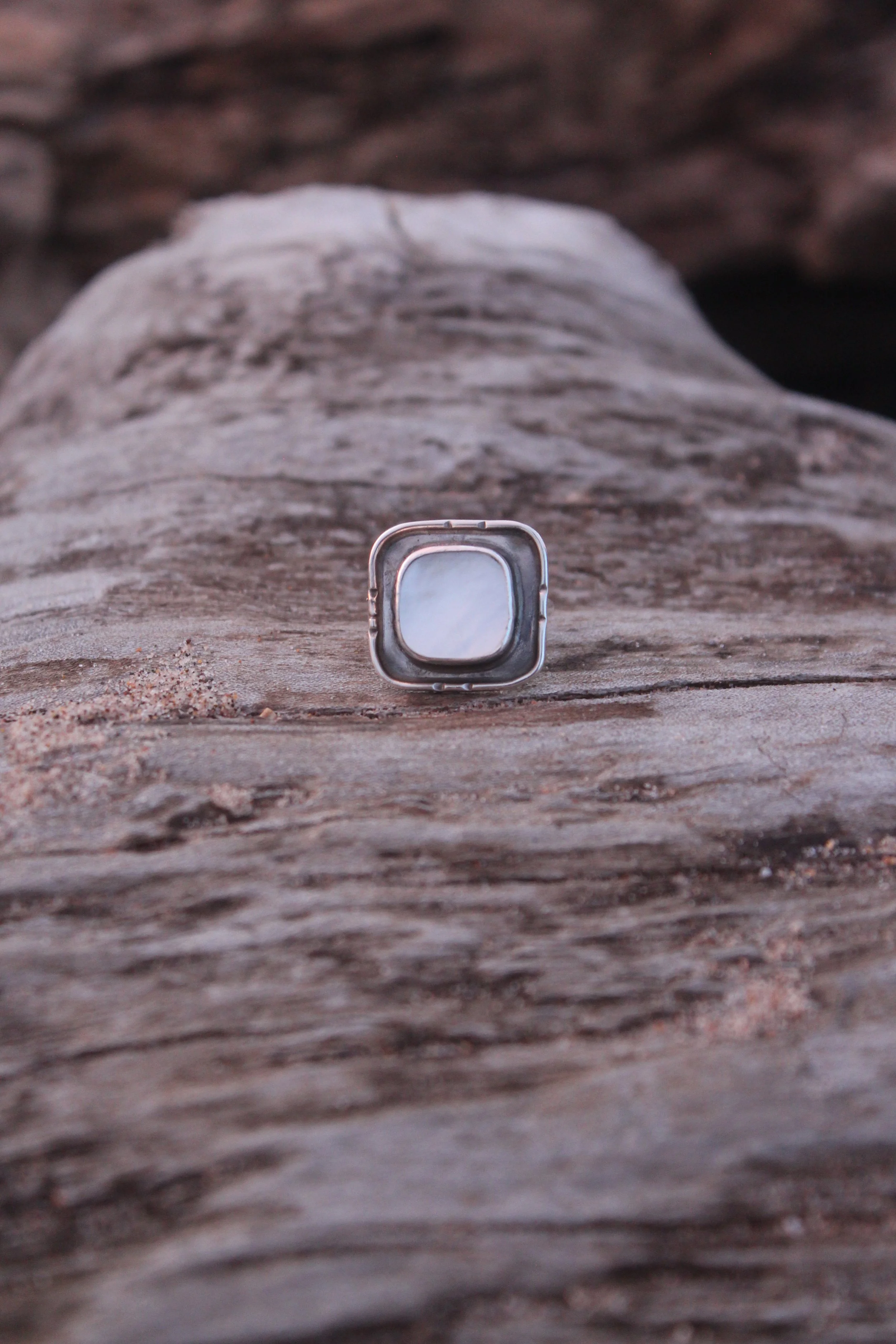 Mother of pearl symmetry ring