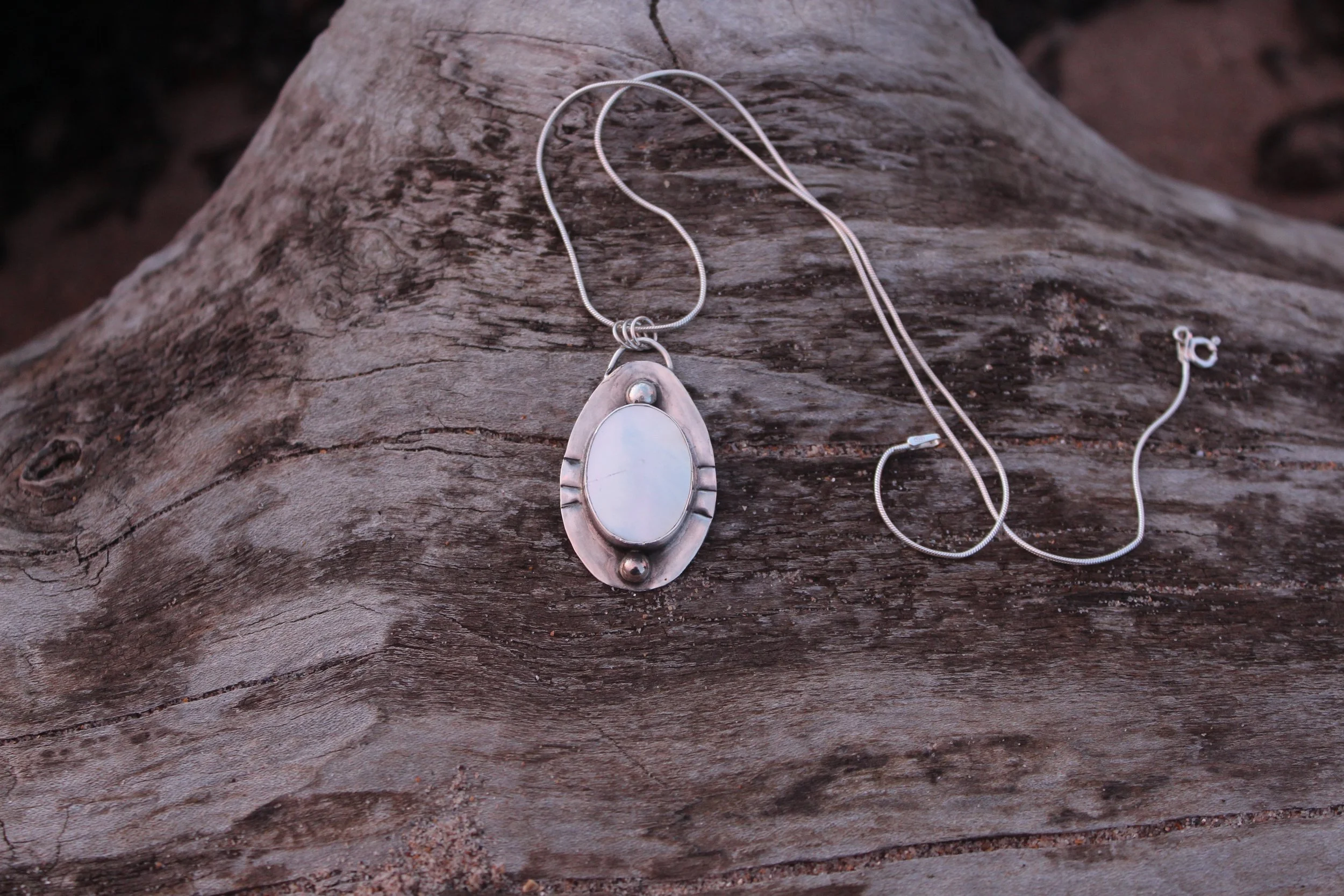Mother of pearl symmetry pendant