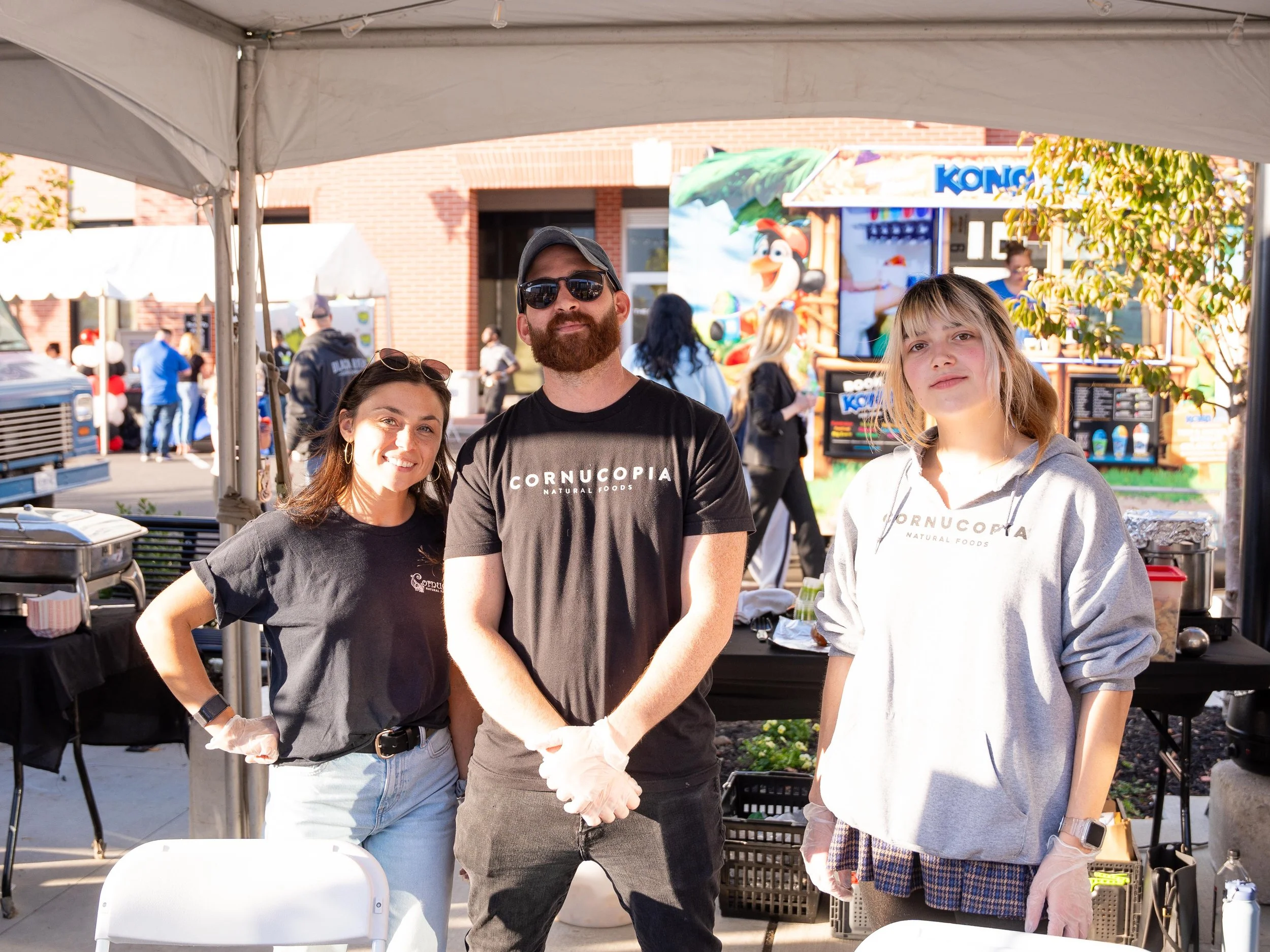 Cornucopia Staff At Vendor Booth