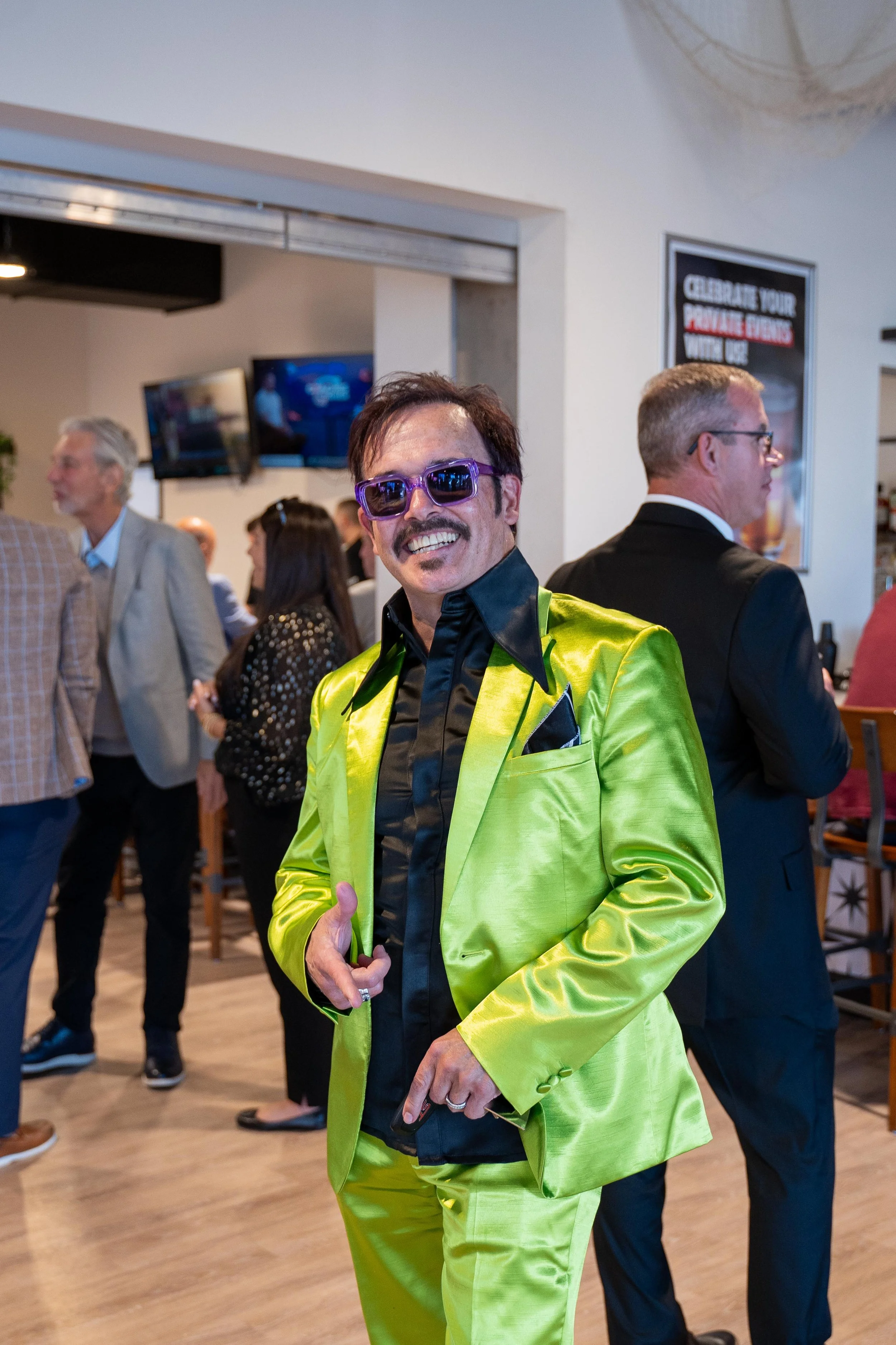 Man In Satin Green Suit