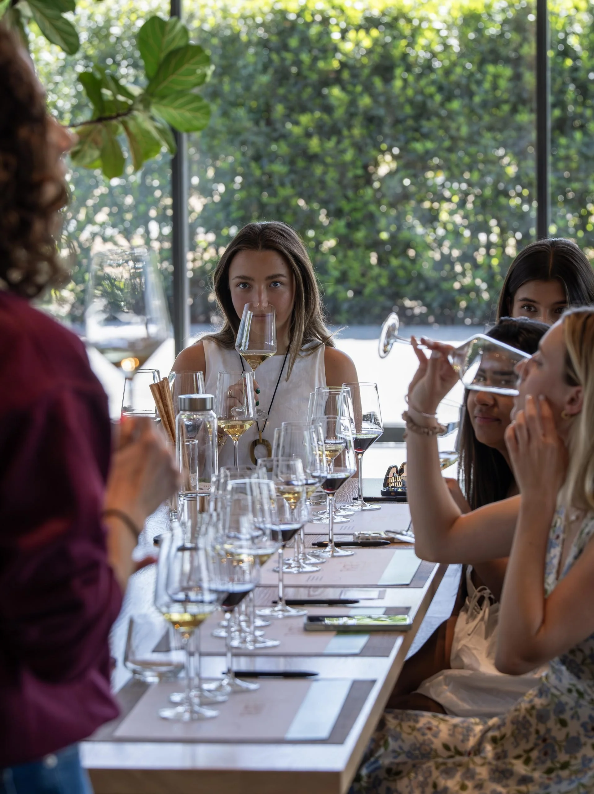 Young people learning about wine