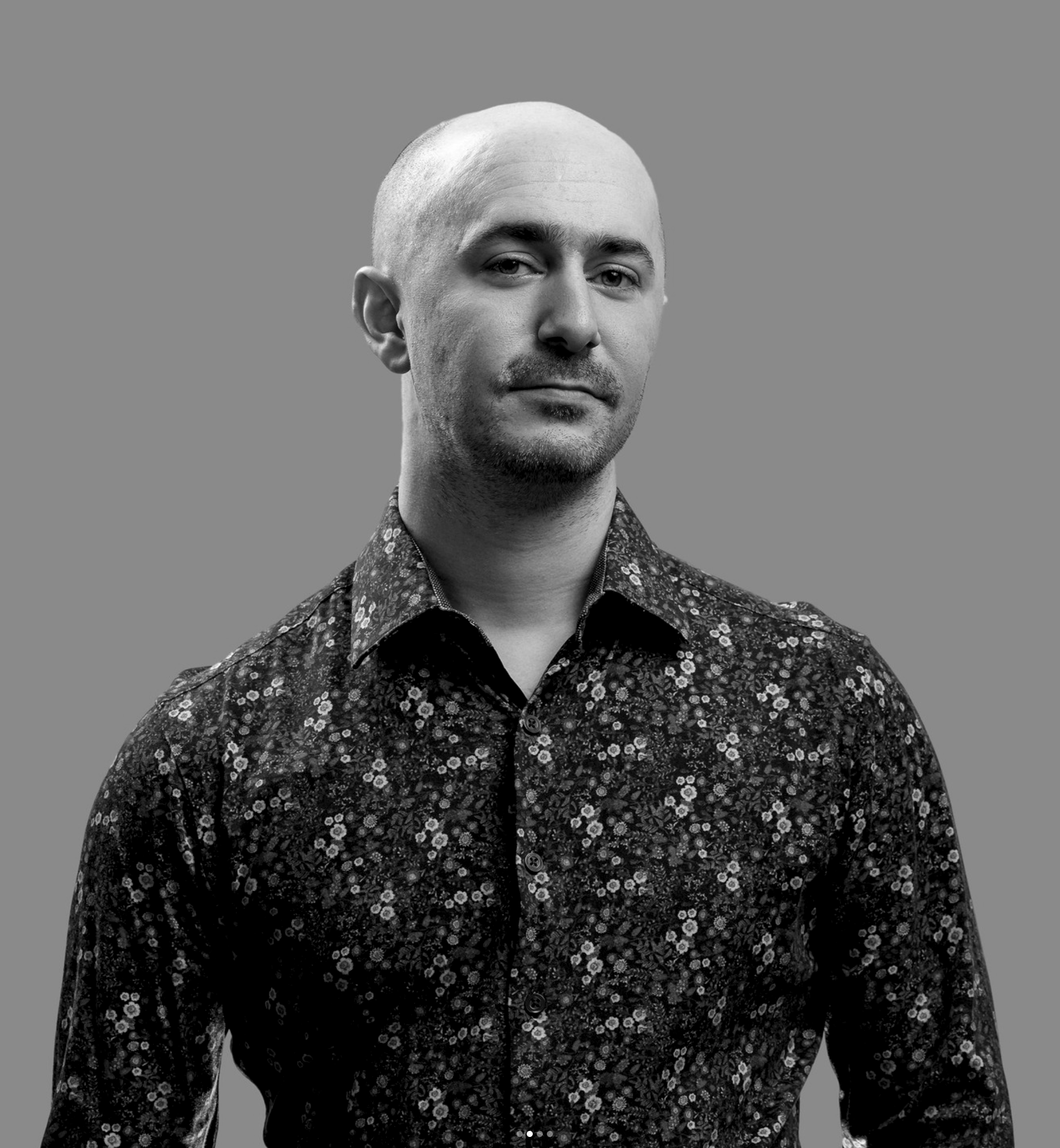 Black and white portrait of Spencer Ryerson against a plain background.