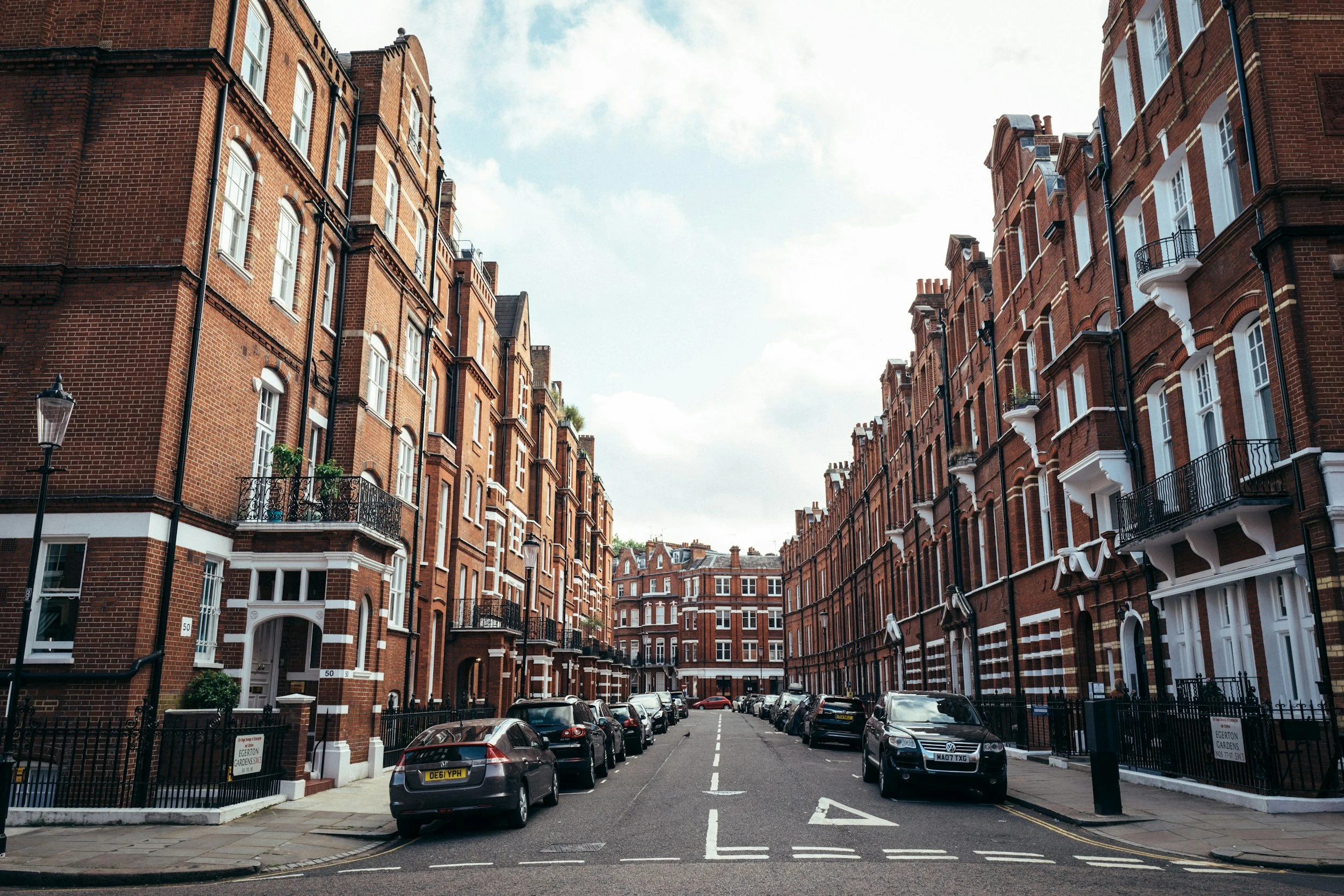 A street of red-brick mansion blocks in South West London