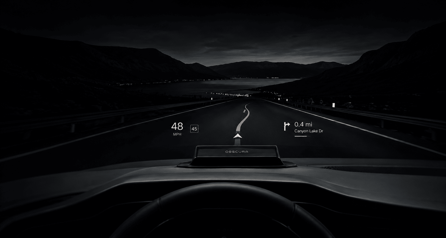 CLARITY projecting turn-by-turn navigation onto a windshield at dusk