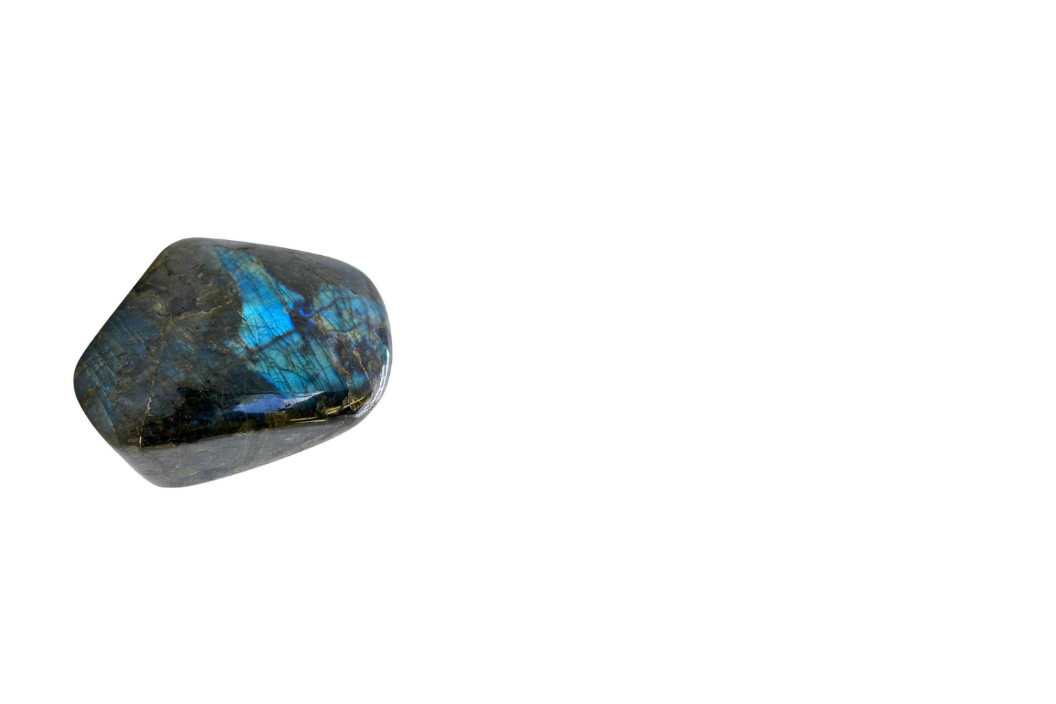 A polished labradorite gemstone with blue and gold iridescent colors on a white background.