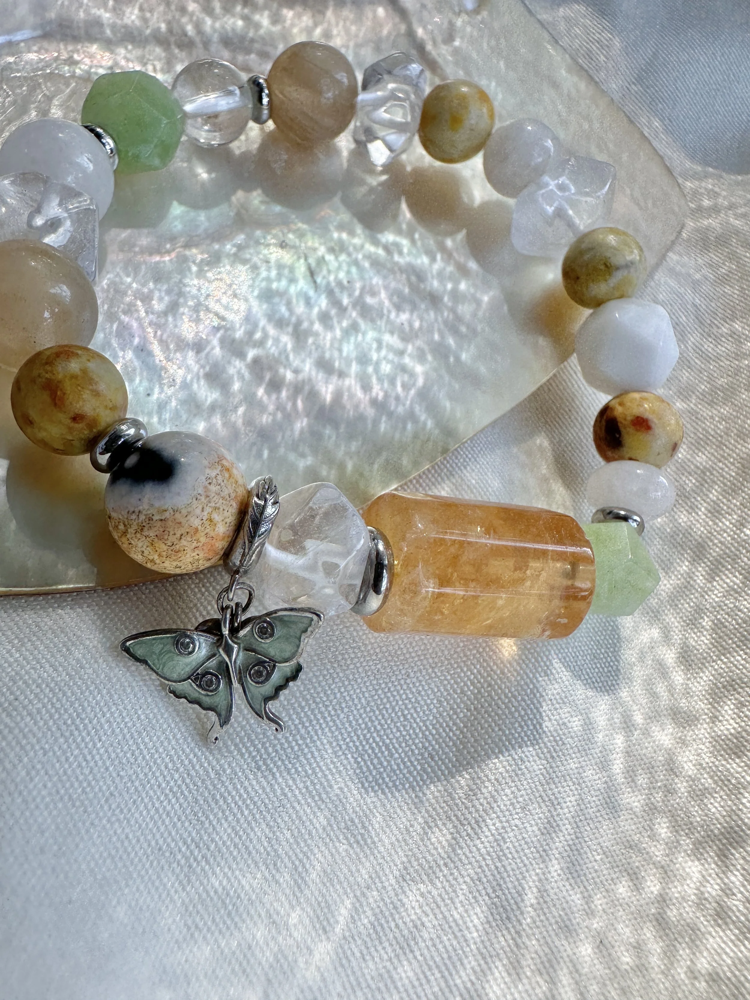 butterfly-charm-gemstone-bracelet.jpg