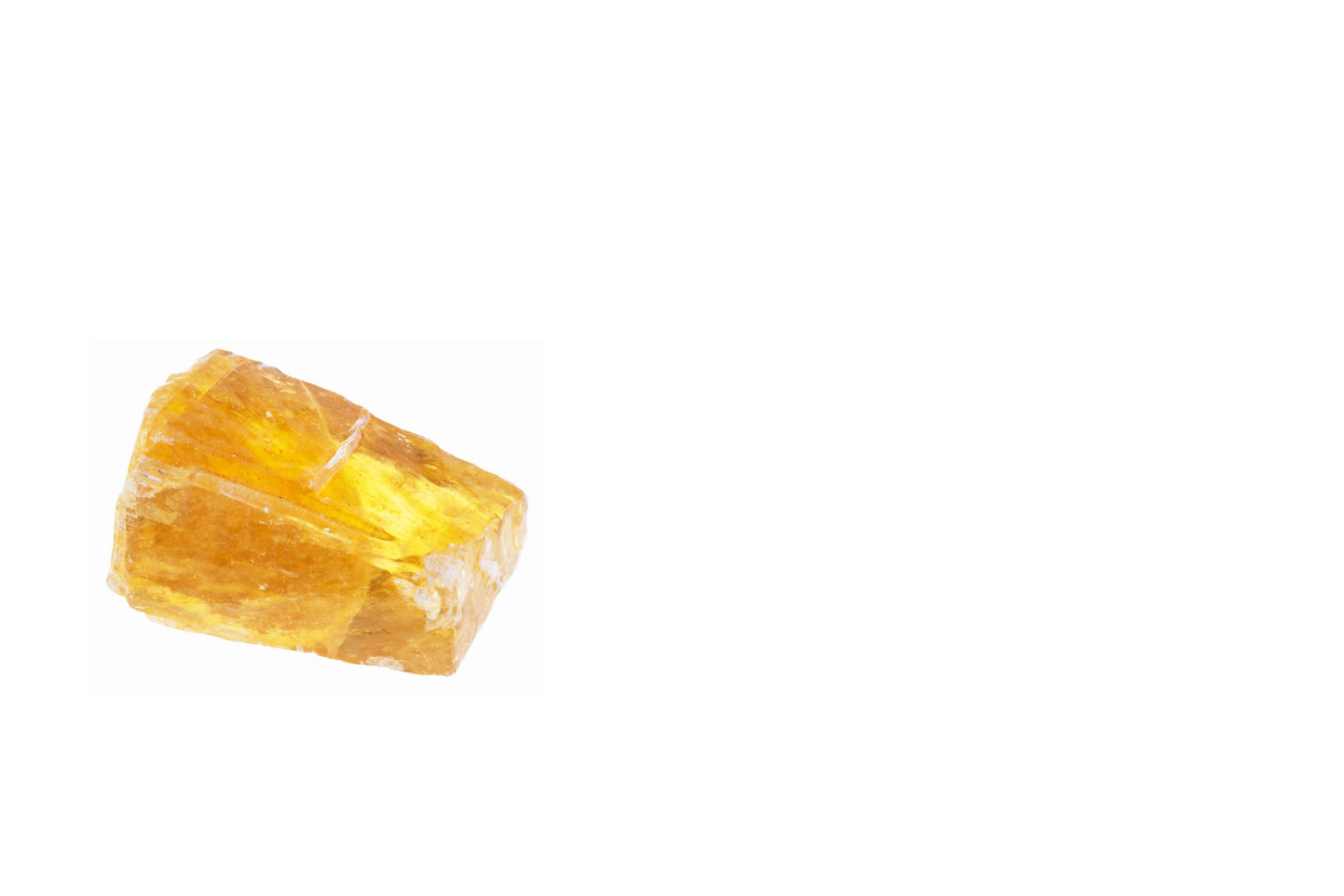 A large chunk of raw amber gemstone with a yellow-orange hue, transparent and irregularly shaped, set against a white background.