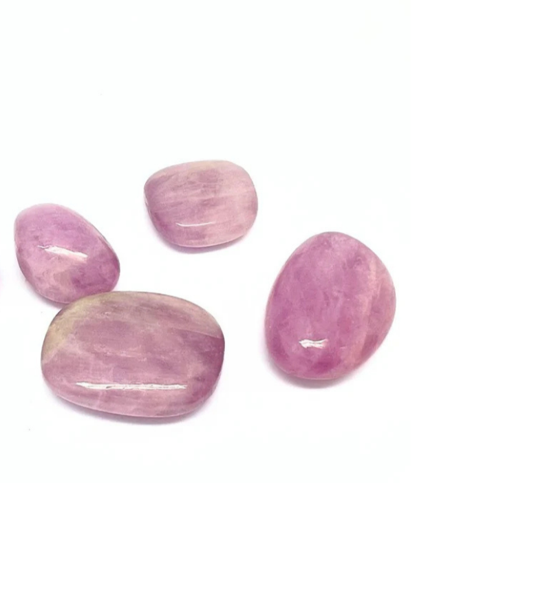 Five polished pink stones with streaks of white and purple on a white background.