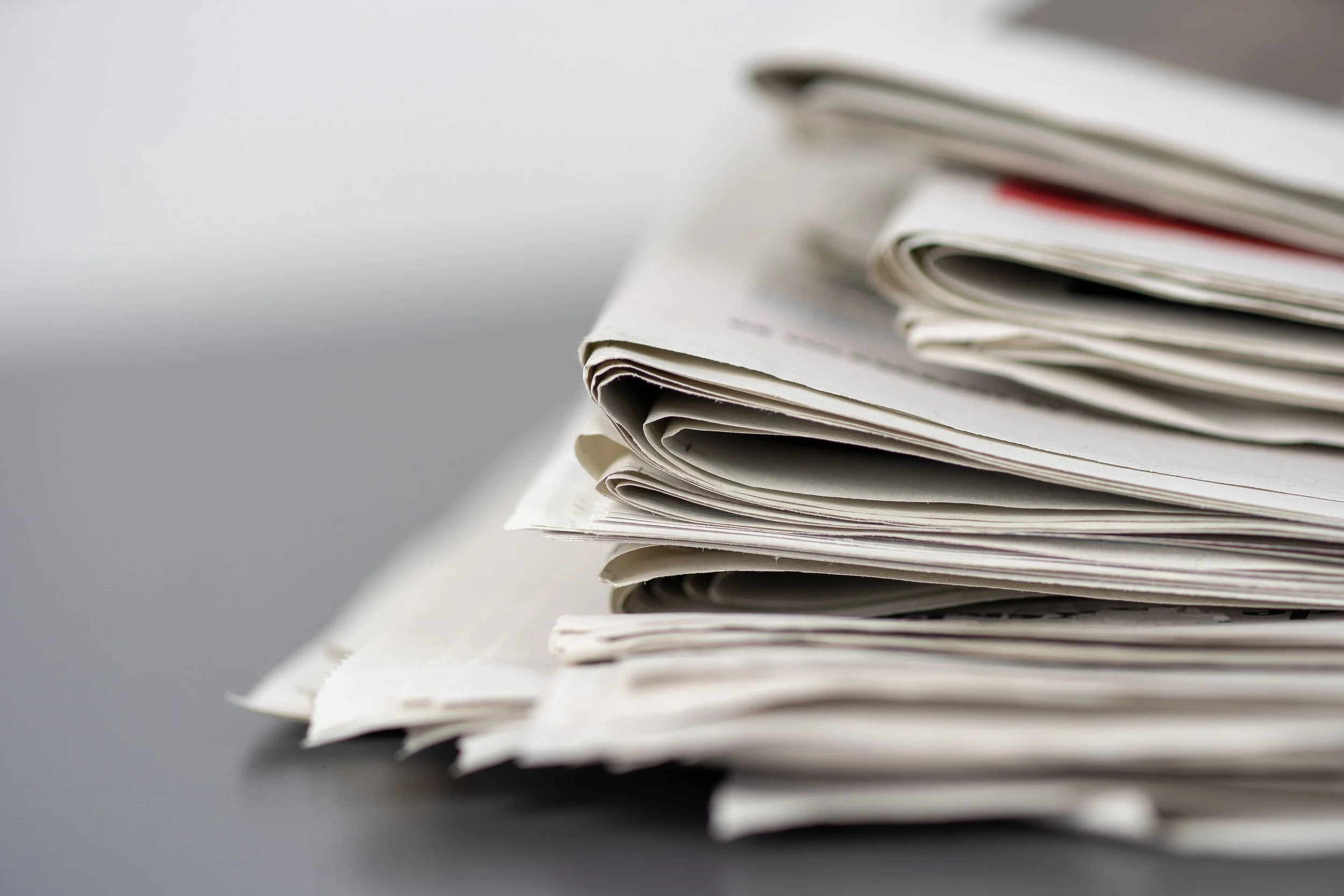 Image of a stack of newspapers