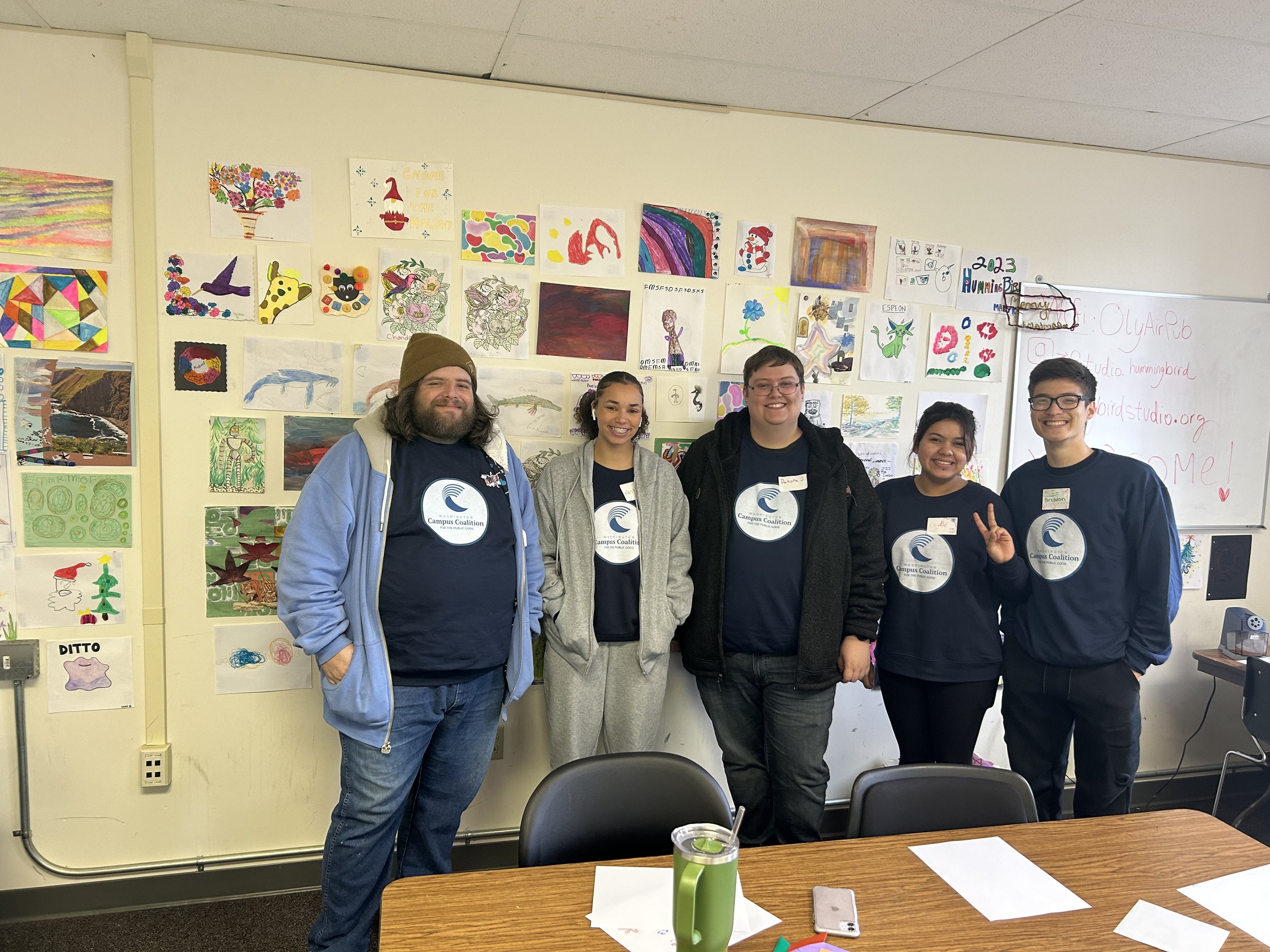 Group wearing Washington Campus Coalition t-shirts.