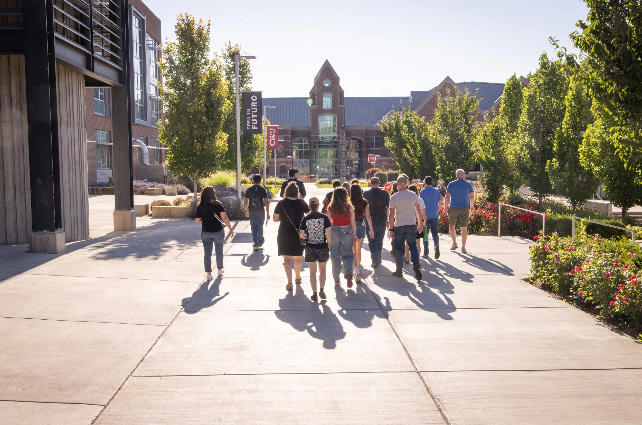 Photo of people walking on Central Washington University's Campus. Credit: CWU Flickr.
