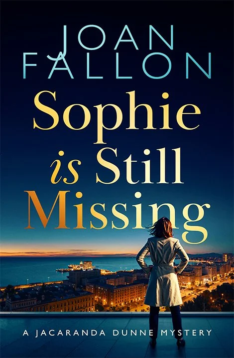 Book cover of Sophie is still missing by Joan Fallon featuring a woman looking over a harbour.