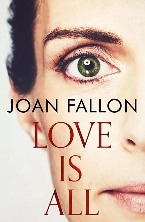 Book cover of Love is All by Joan Fallon showing half of a young woman's face.