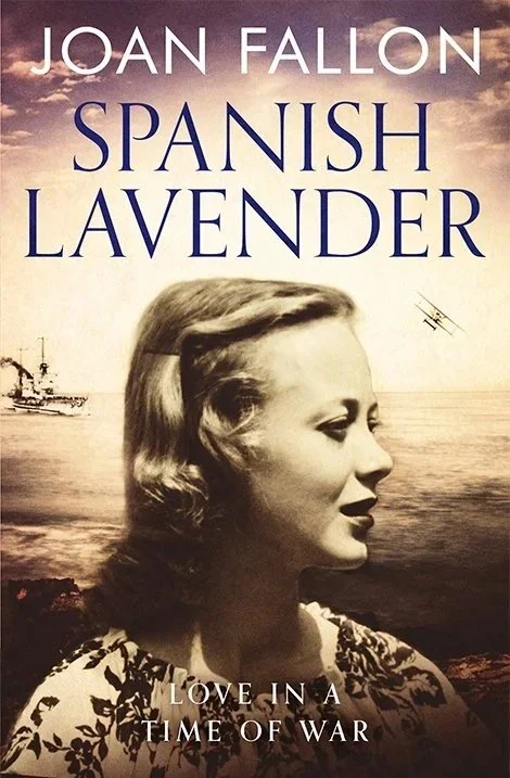 A monochrome book cover of Spanish Lavender by Joan Fallon showing a young woman with war planes in the sky behind her.