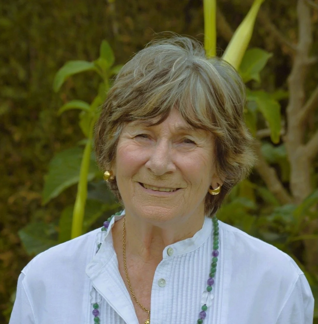 Photograph of author Joan Fallon in her garden