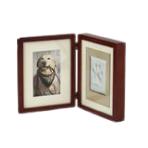 A folding picture frame with a portrait of a dog on the left and a beach scene on the right.
