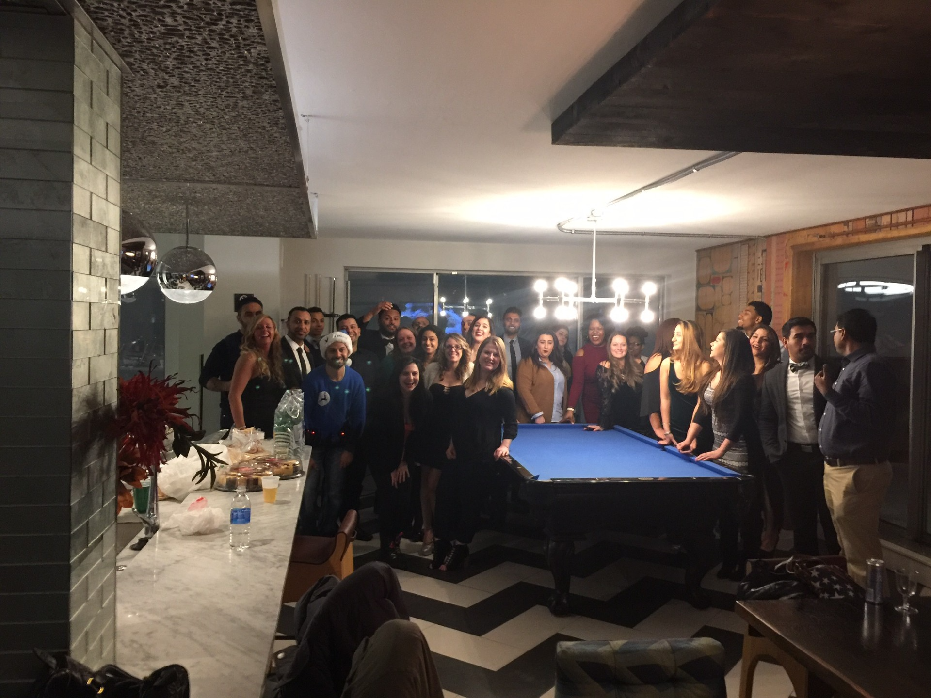 "A holiday celebration at my downtown Detroit apartment with the management team (MSO). Looking at this photo now, the laughter is overshadowed by a singular, haunting truth: I disappointed every person in this room. I built the opportunity, but I fa
