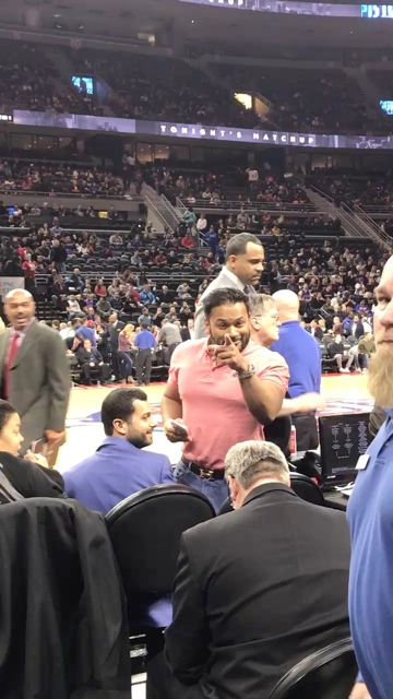 "Winter of 2016 Courtside: I Believed I was untouchable. Over a decade in business and well past my first quarter billion, I had stopped listening. In this photo, security (guy in blue shirt with name tag) notified me that authorities asked where my 