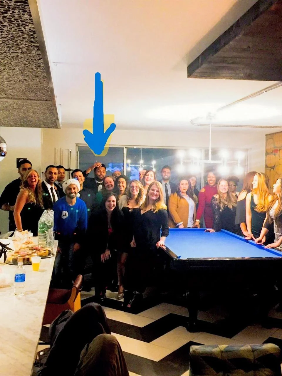 "A holiday celebration at my downtown Detroit apartment with the management team (MSO). Everyone didn't make this picture but looking at this photo now, the laughter is overshadowed by a singular, haunting truth: I disappointed every person in this r