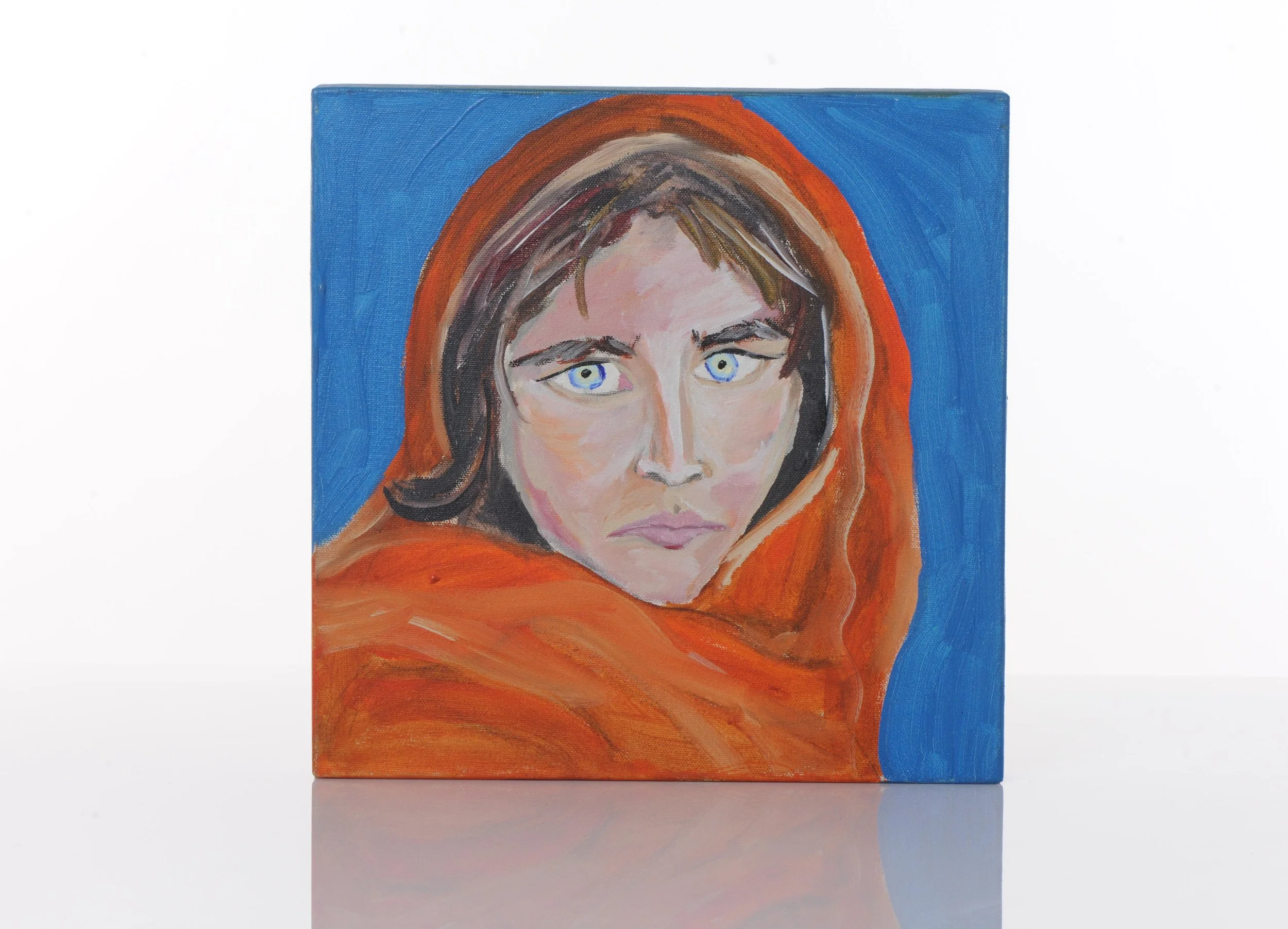 Painted portrait of a woman with blue eyes, brown hair, wearing an orange shawl against a blue background.