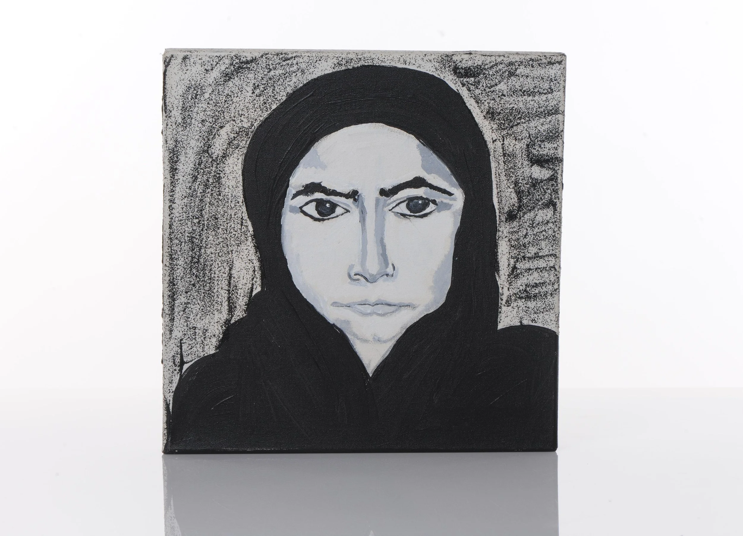 Portrait of a woman with dark hair, wearing a headscarf, painted in monochrome tones on a canvas.