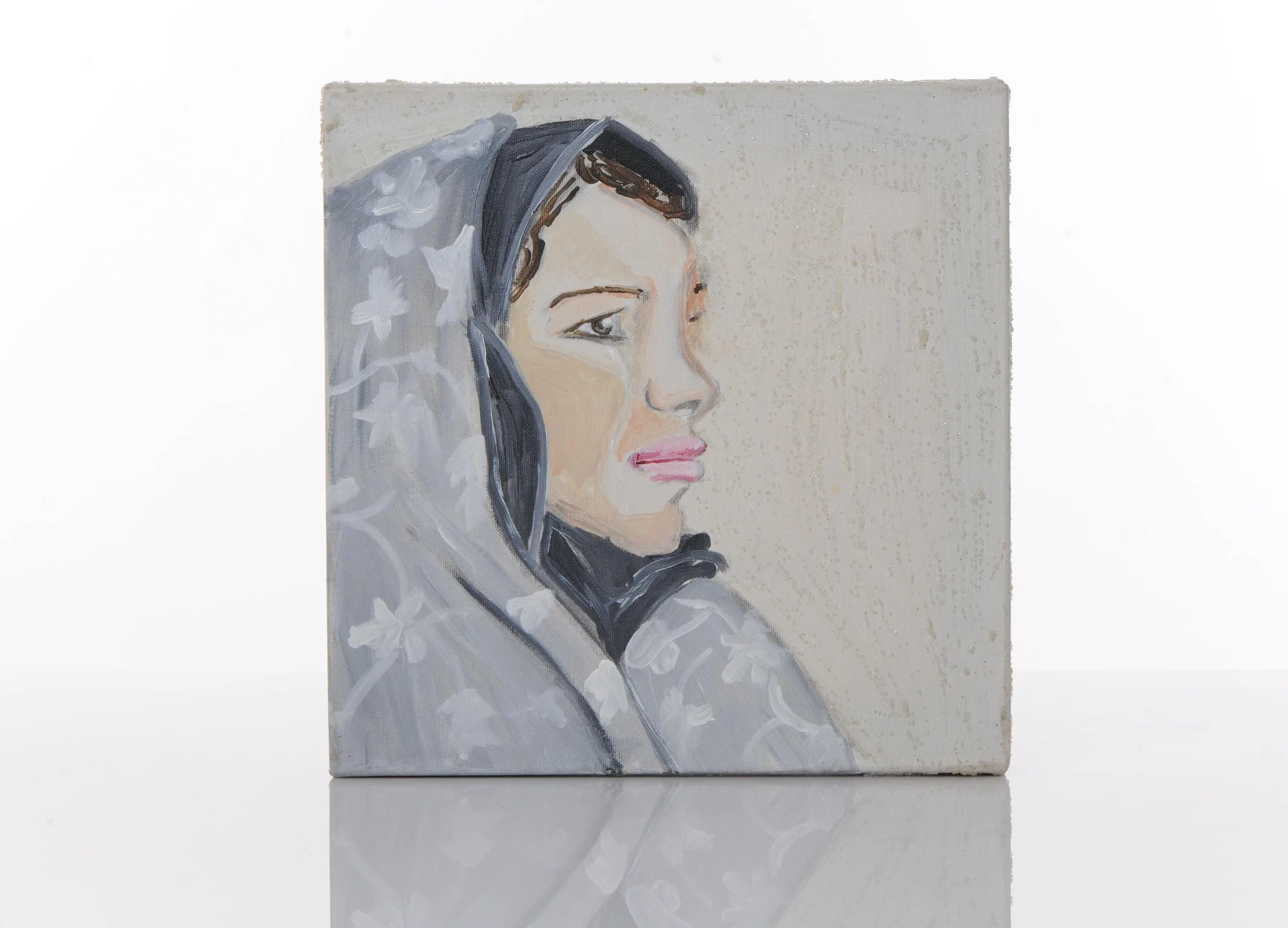Painting of a woman with a somber expression, wearing a gray headscarf with floral patterns, depicted in profile against a textured beige background.