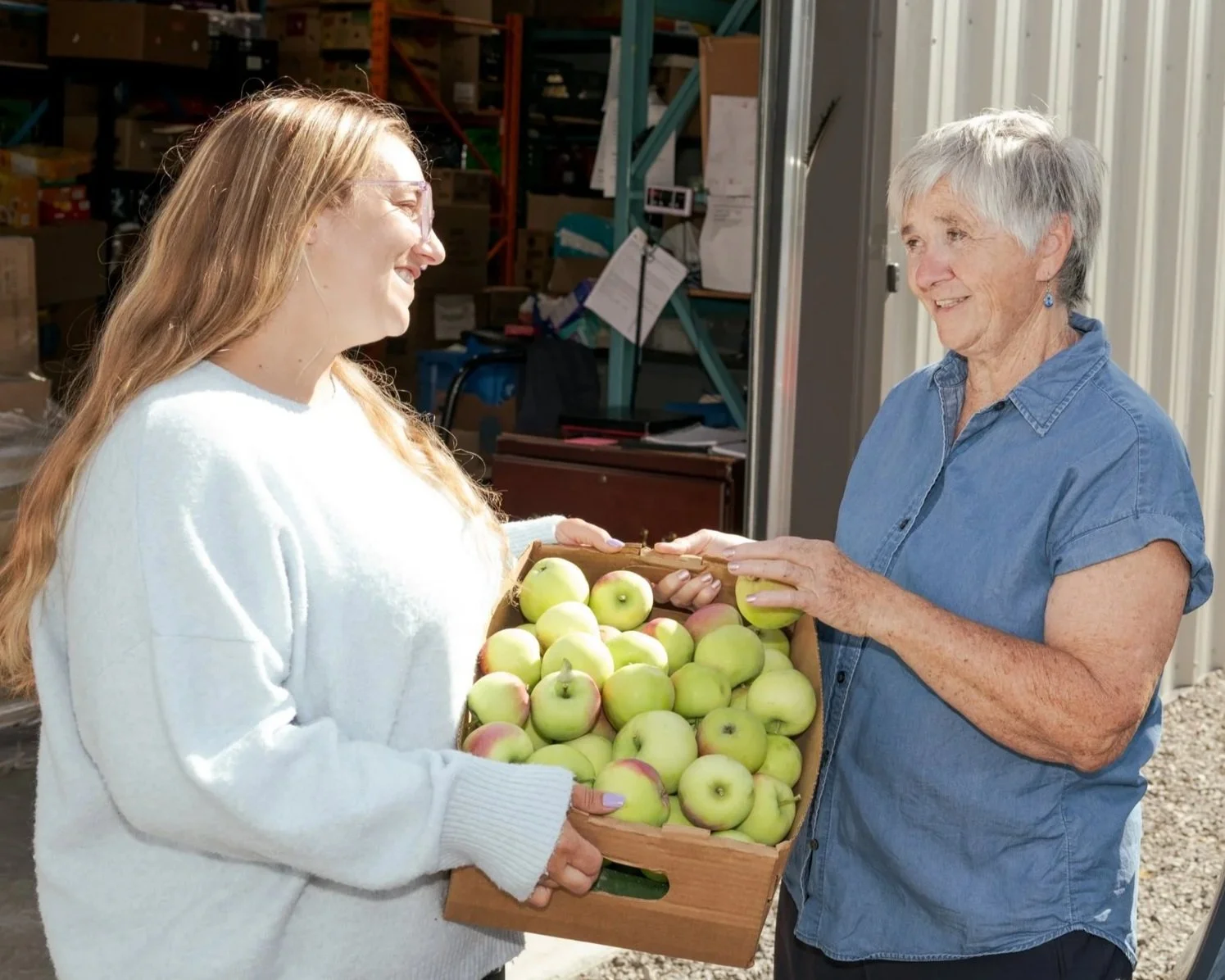 Theresa Bergeron donating applies to a North Dundas foodbank.