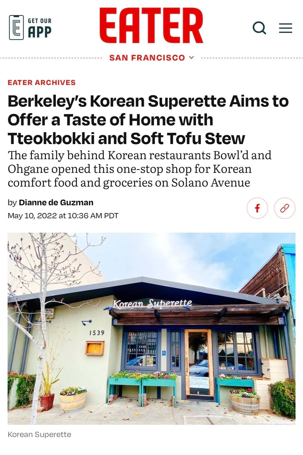 Front entrance of the Korean Superette restaurant at 1539 Solano Avenue, with windows, planters, and potted plants outside, and the restaurant's sign above the door.