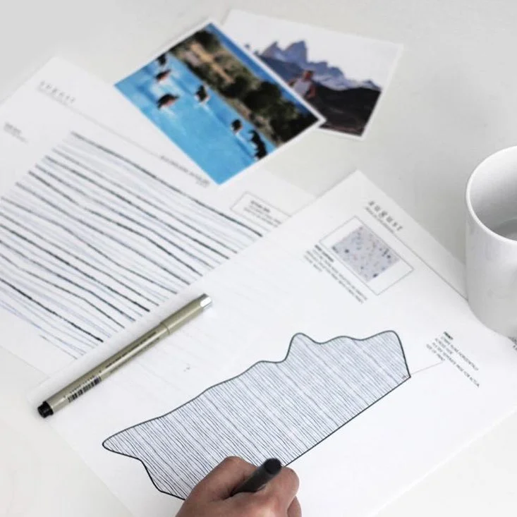 Melissa, founder of KAIA Consulting, sketching custom leather print design