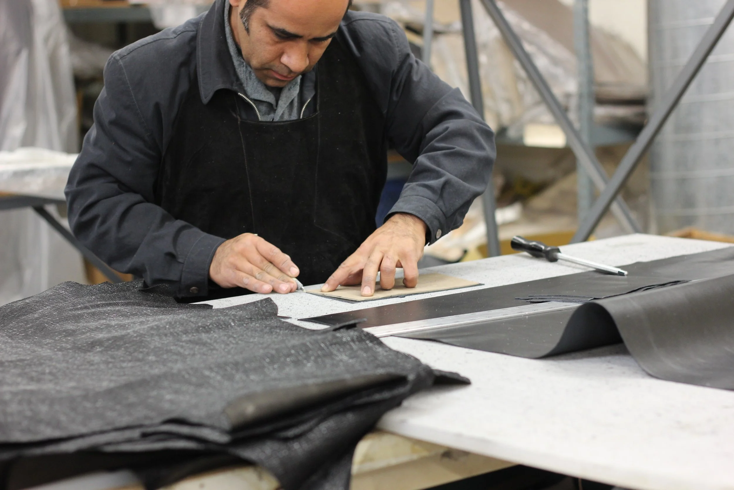 Factory craftsman at downtown Los Angeles handbag manufacturer. KAIA Consulting business development strategy