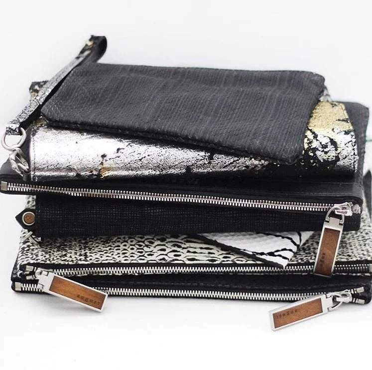 August Handbags clutches