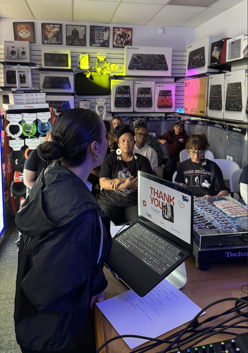 Denver DJ School teacher DJ Rewild sharing her knowledge with workshop attendees