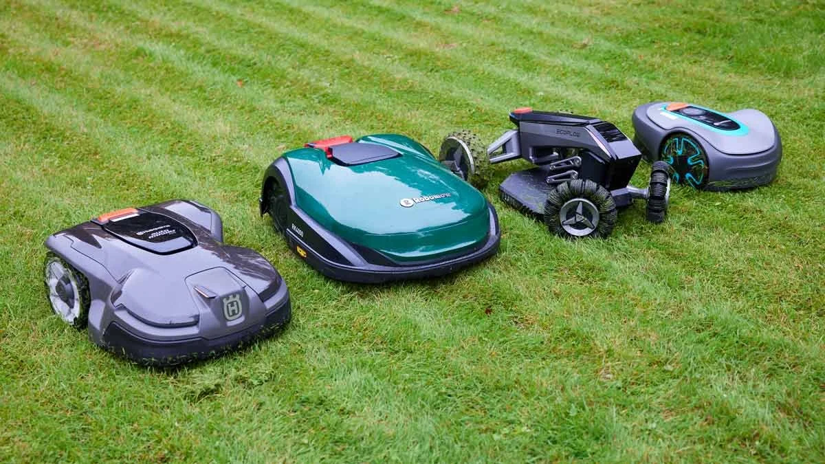 several autonomous lawnmowers lined up