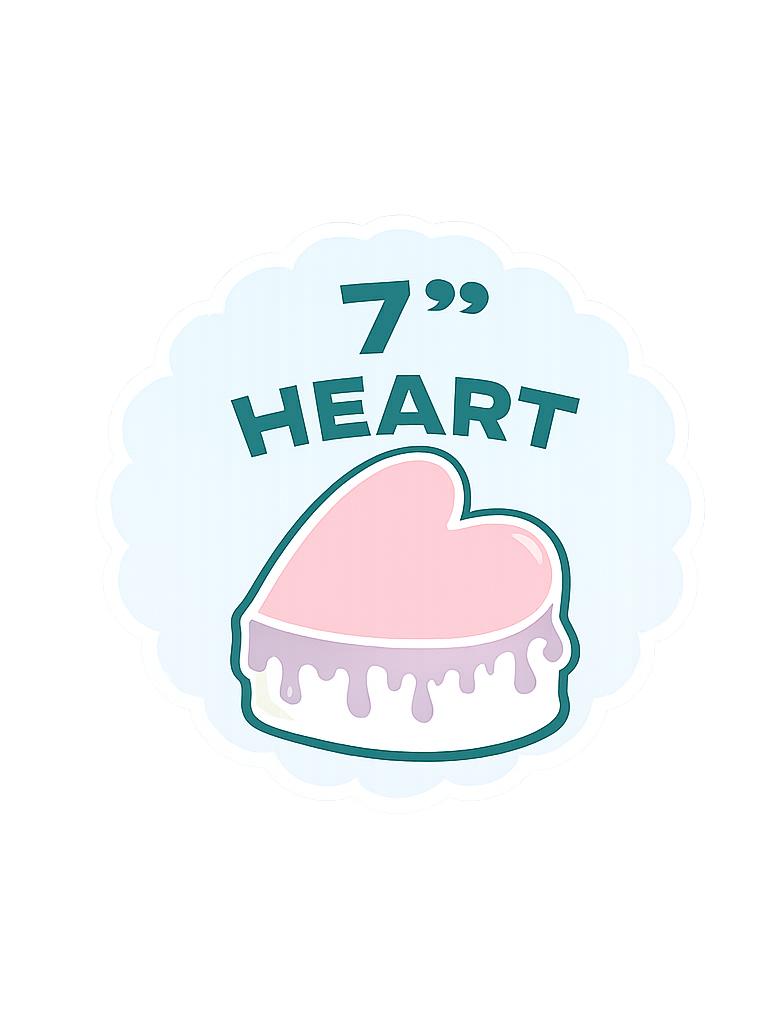 A cake with purple icing and white icing on the bottom, with the text '7'' Heart' cake option