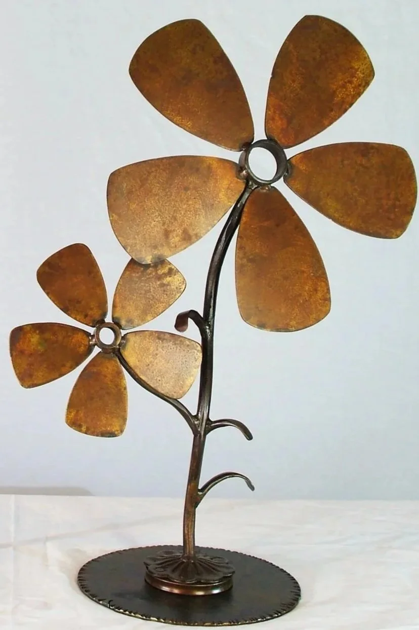 Pacific Northwest Sculpture artist Chet Redmon petrified flowers metal flowers garden art garden sculpture