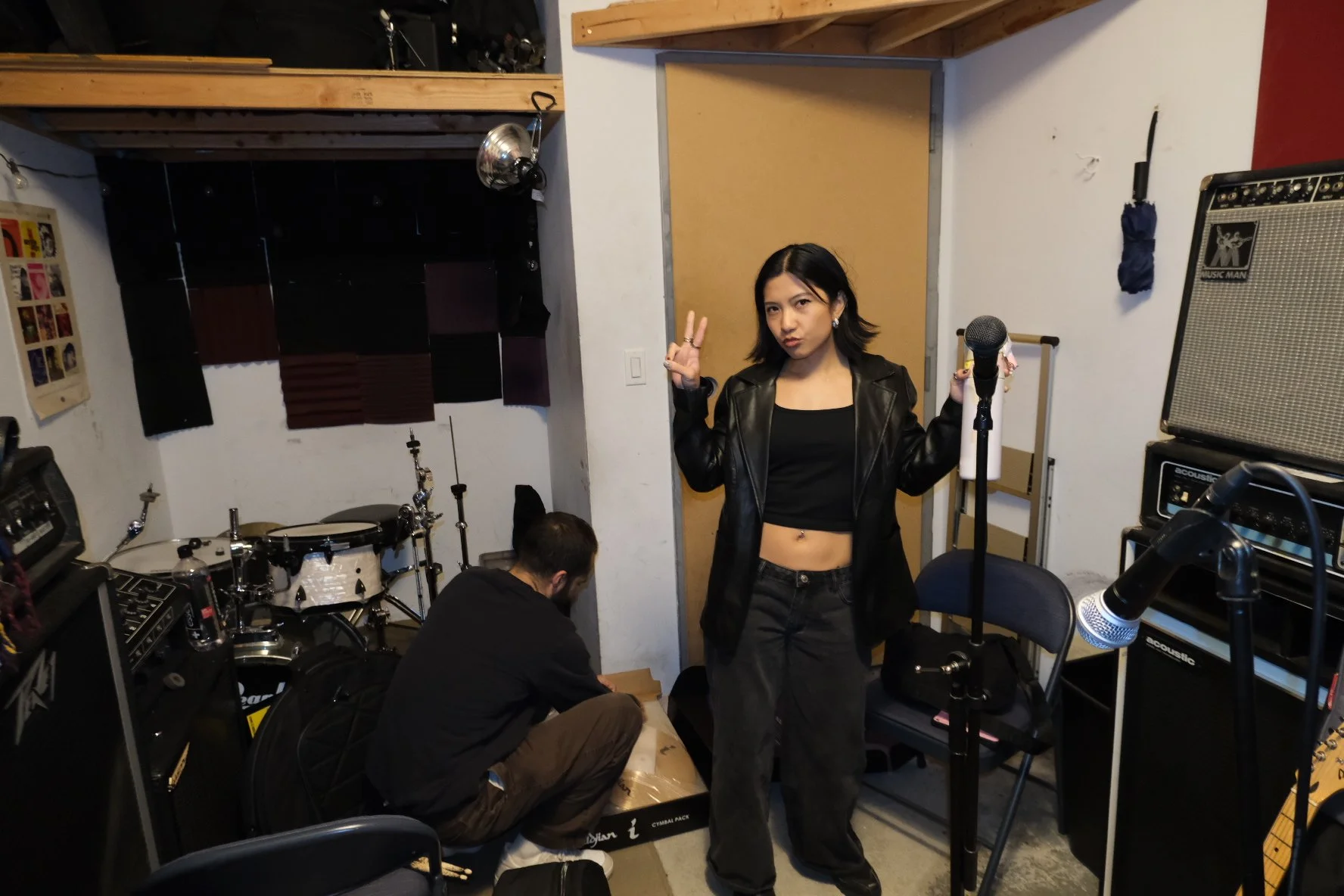 Vincent opening up new cymbals with Carissa posing.jpg