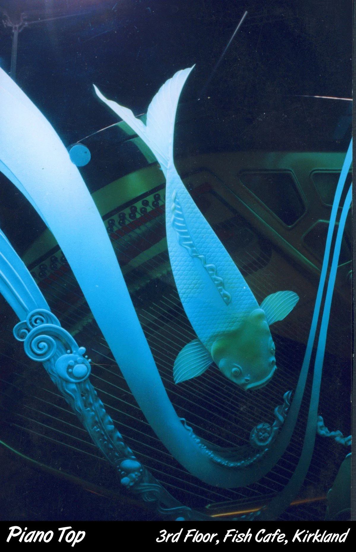 Close-up of Carved Glass Piano Top for 3rd floor Fish Cafe - Seattle, WA