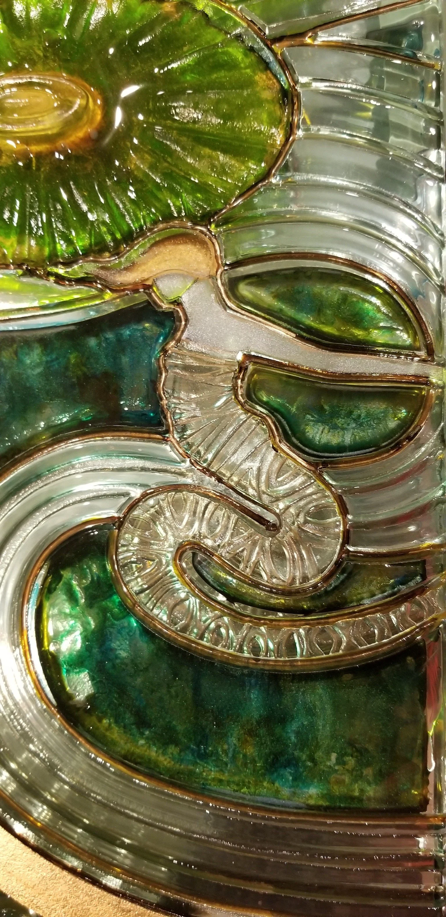 Close up of "Tree of Life"'s Carved Glass frame