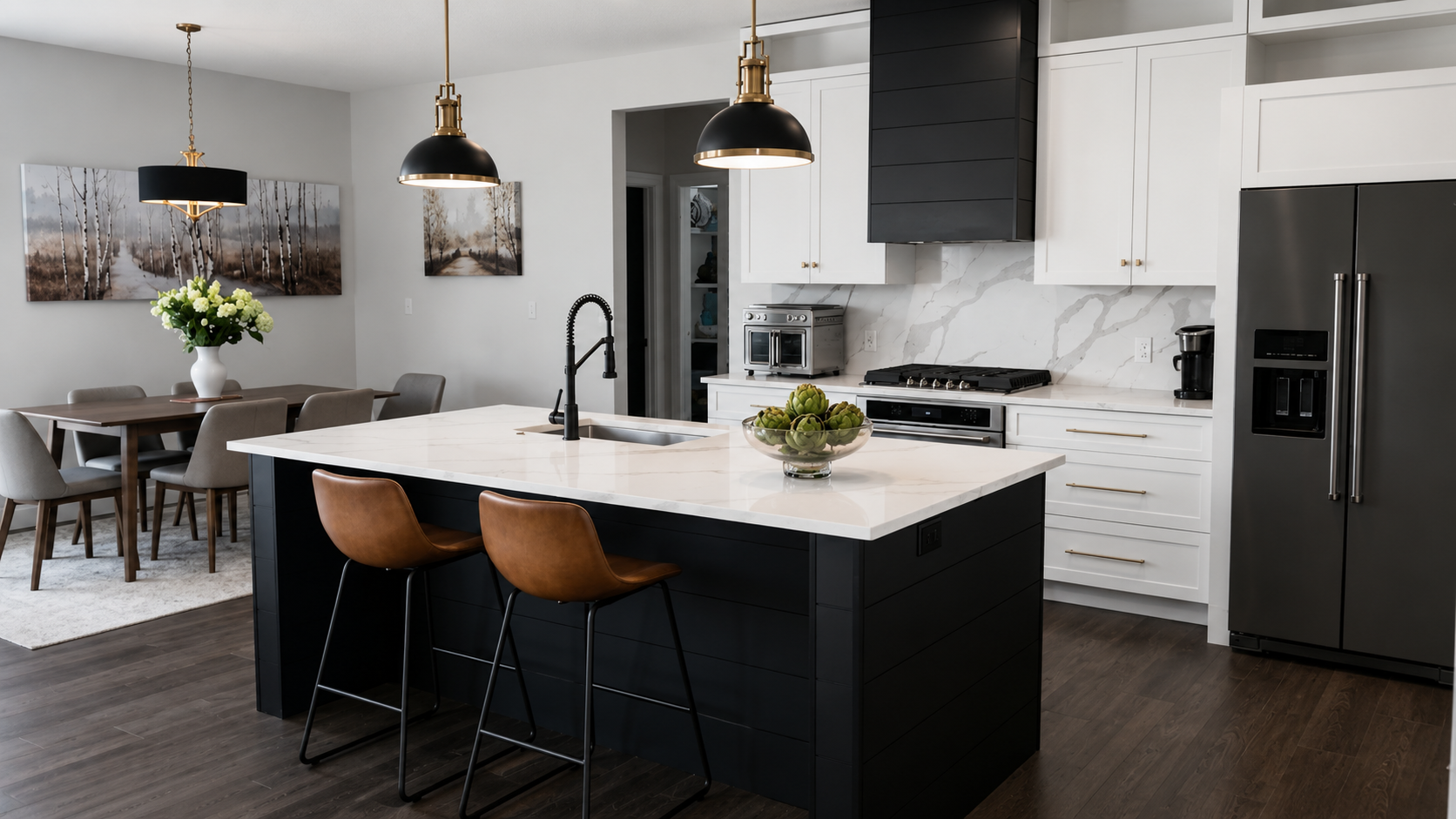 Finished open-concept kitchen remodel featuring a custom black island, white shaker cabinets, quartz countertops, black range hood, luxury appliances, and adjoining dining area in Marengo, Ohio.