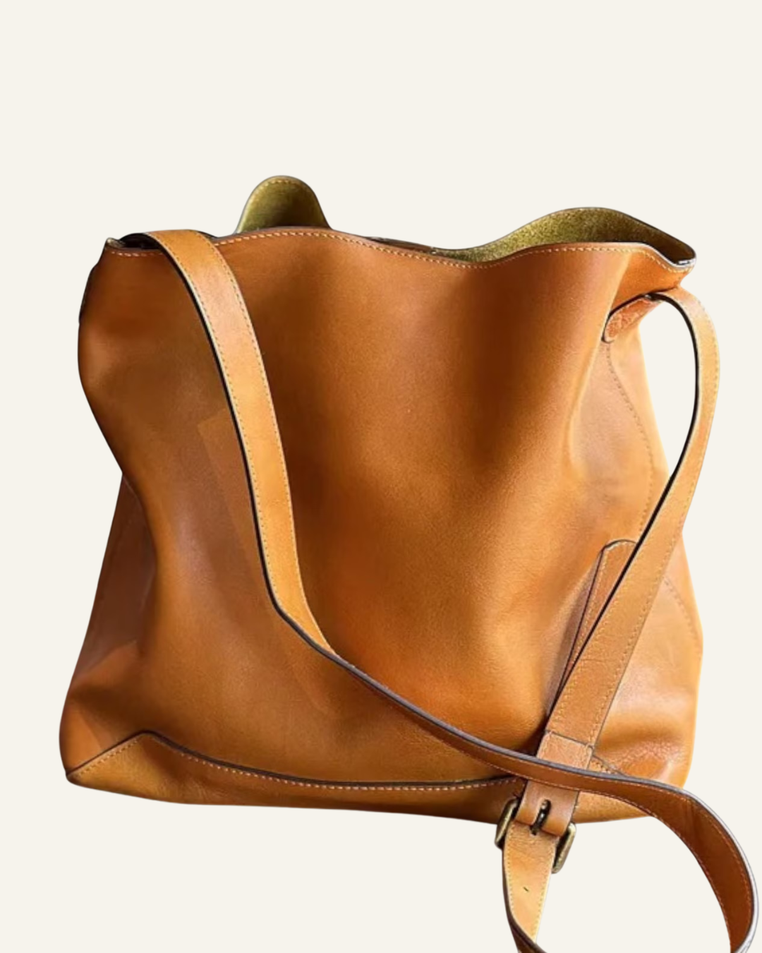 brown leather tote bag with belt style leather handle
