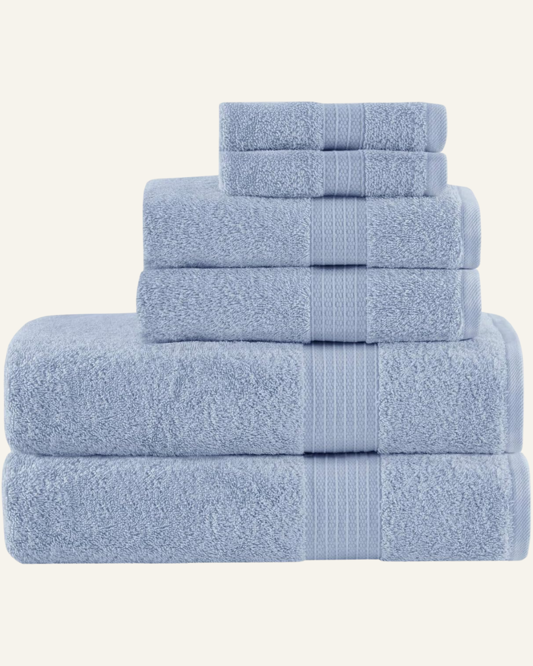 blue towels, 2 bath, 2 hand and 2 facecloths all stacked on top of one another