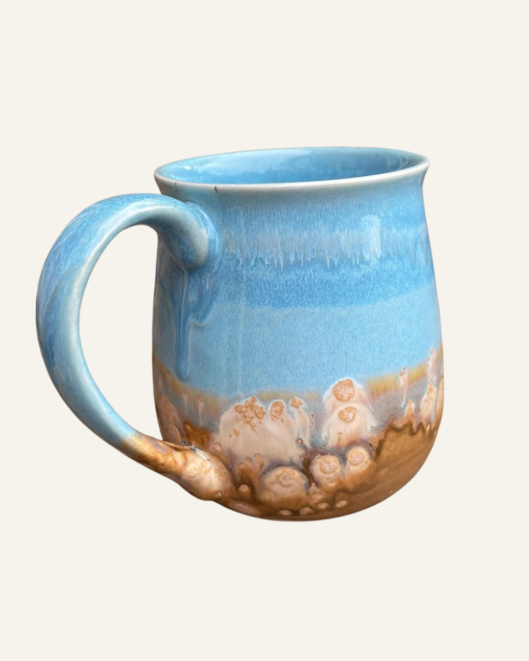 handmare stoneware mug, top 2/3 blue and bottom 1/3 brown sand design