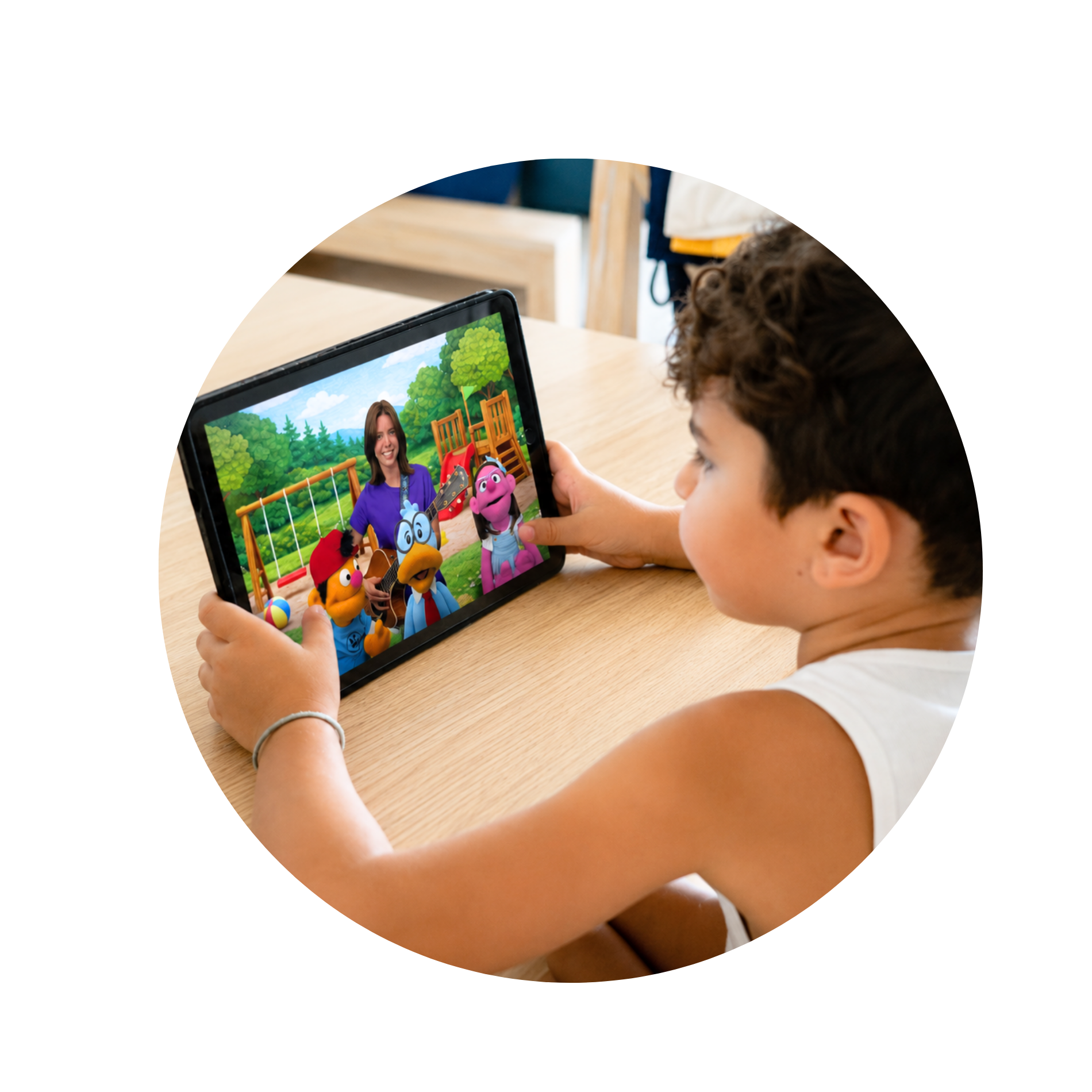 Child playing on a tablet with animated characters in a colorful outdoor setting