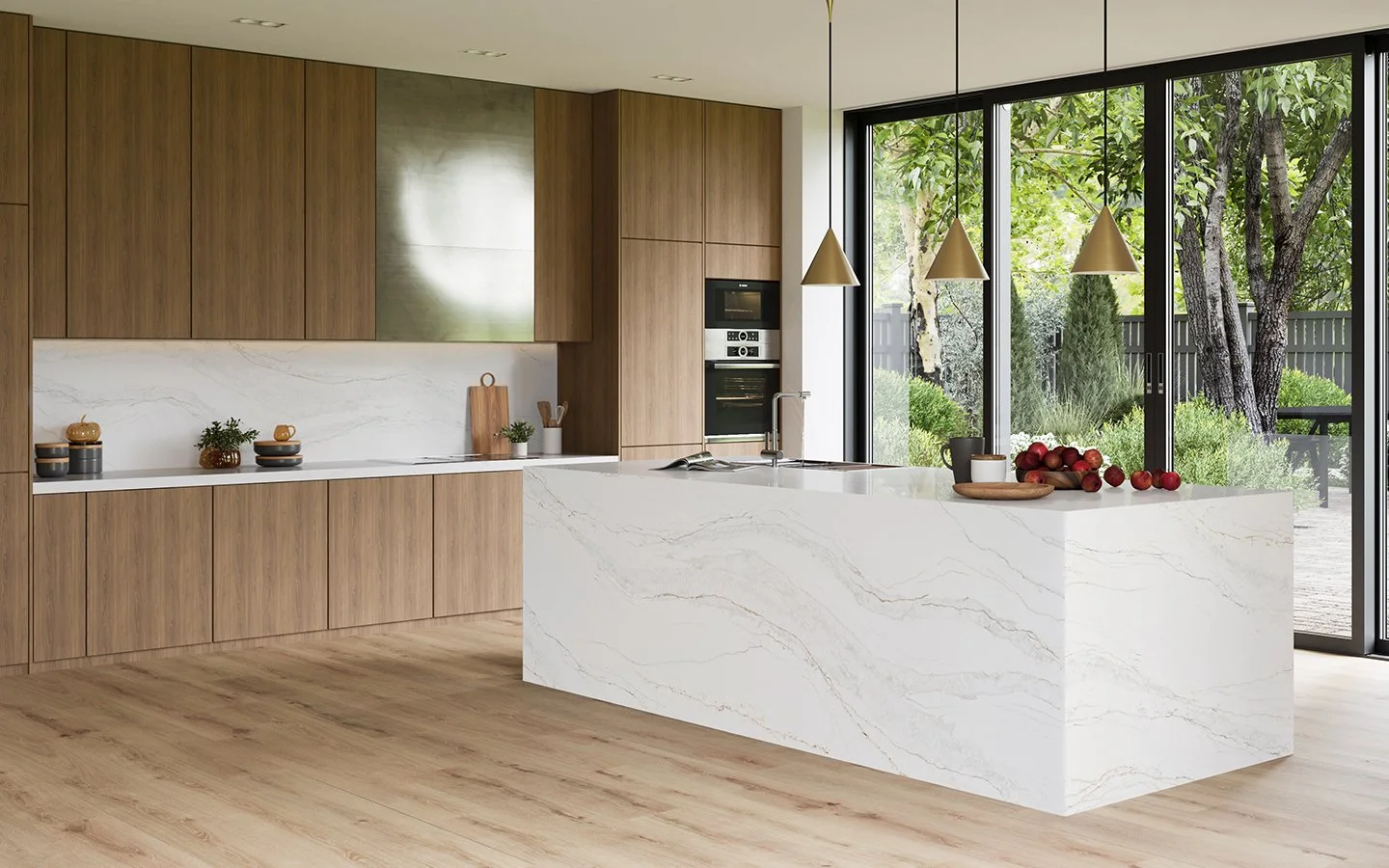 Modern kitchen with wooden cabinetry, white marble island, and large sliding glass door to outdoor garden with trees and bushes.