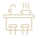 Kitchen counter with a faucet, sink, and two stools.