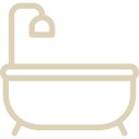 Outline of a bathtub with a shower head and faucet.
