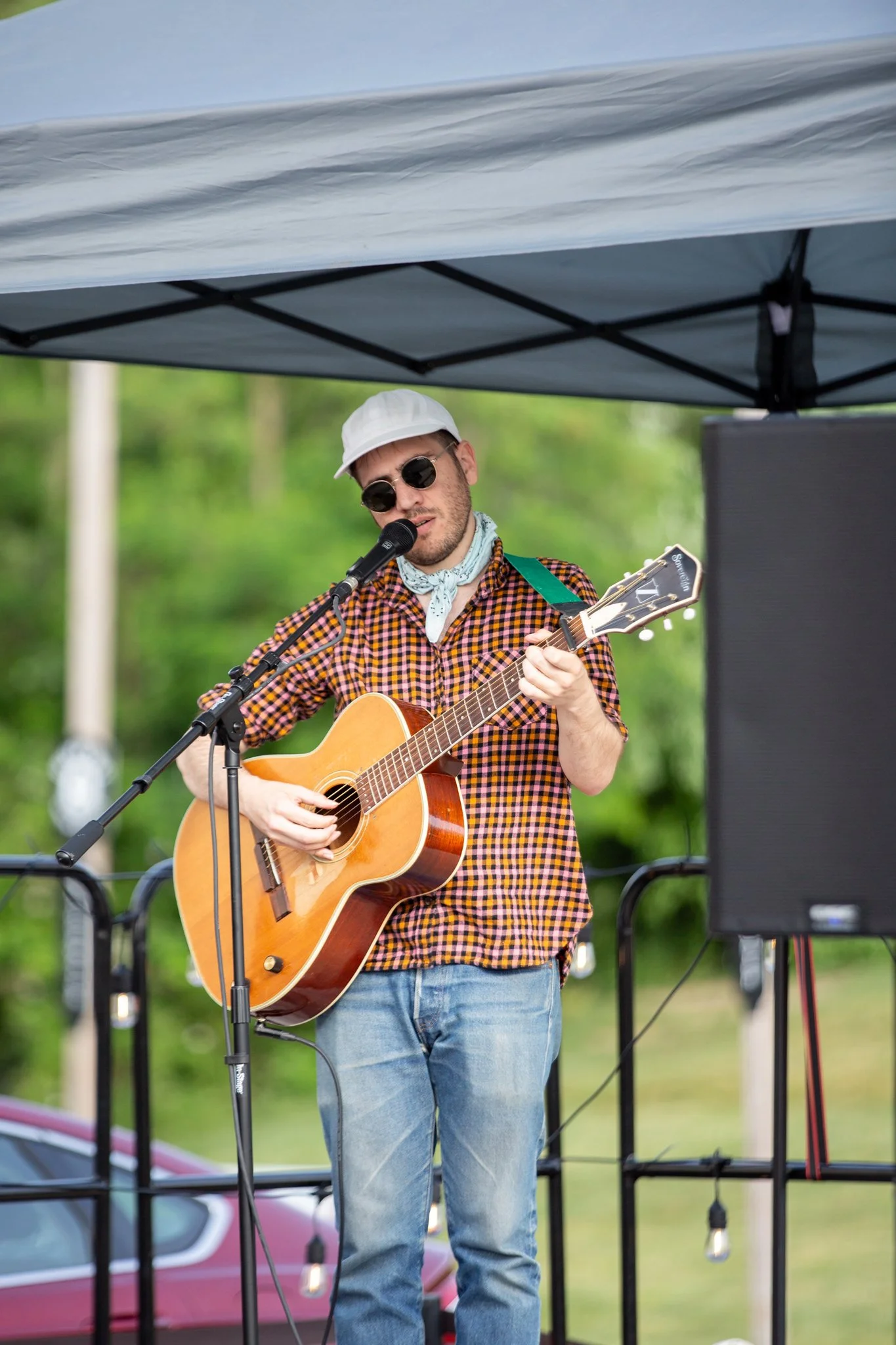 Avi Jacob performs for the Music Alley crowd in the summer of 2023.